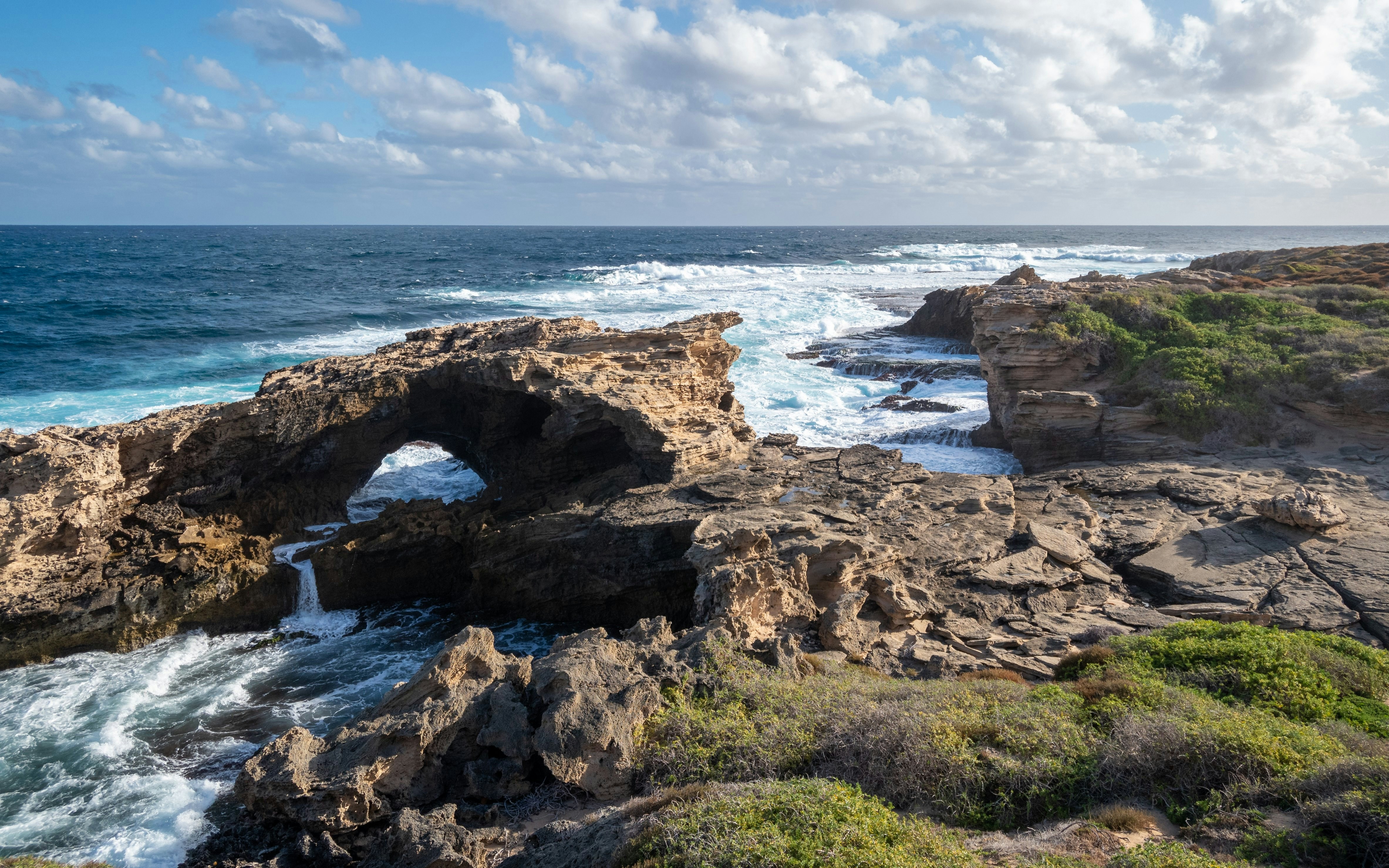 Rock formations and ocean view at West End, Rottnest Island, Western Australia.