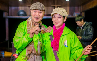Guests enjoying night fishing on Ha Long Bay 5-Star Premium Cruise.