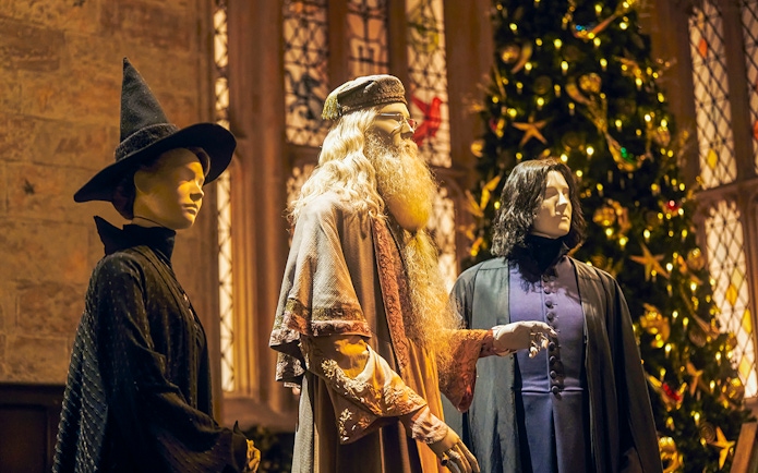 Mannequins of Hogwarts professors in Great Hall with Christmas decor, Harry Potter Studio Tour Tokyo.