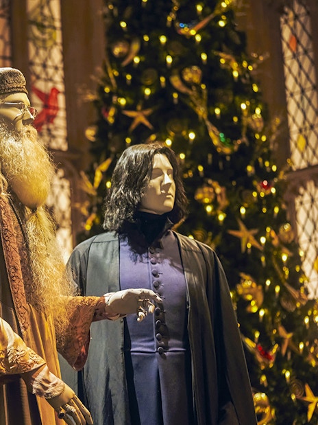 Mannequins of Hogwarts professors in Great Hall with Christmas decor, Harry Potter Studio Tour Tokyo.