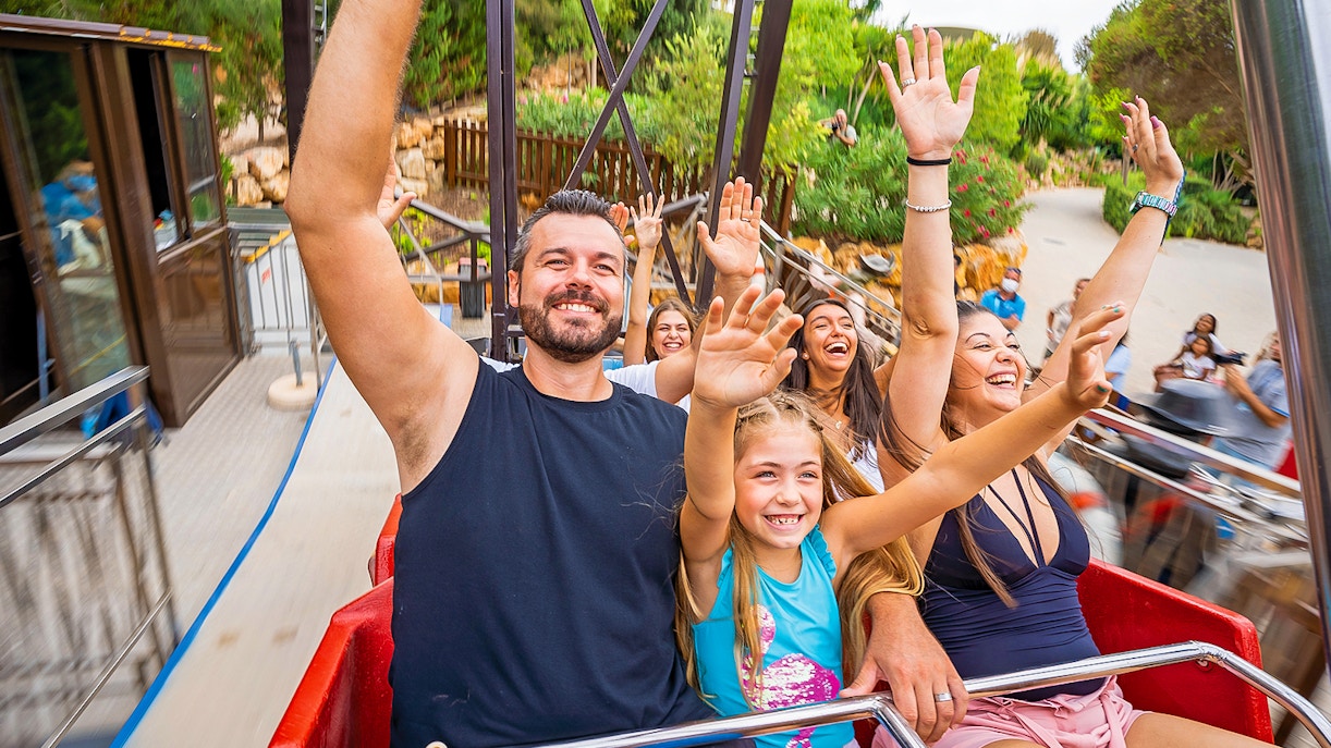Family enjoying dolphin show at Zoomarine Portugal with 2-day tickets.