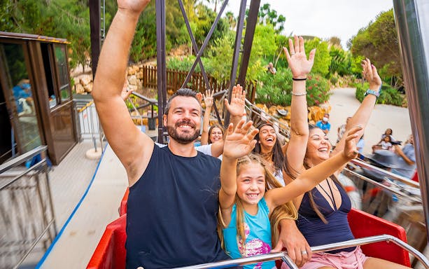 Visitors enjoying a ride at Zoomarine Portugal.
