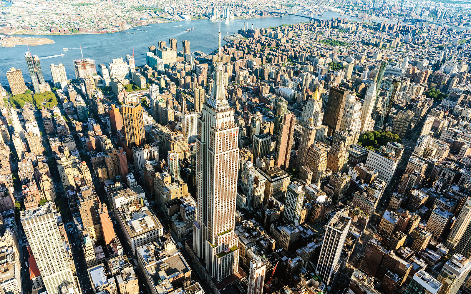 Aerial view of Midtown Manhattan skyscrapers with the Empire State Building.