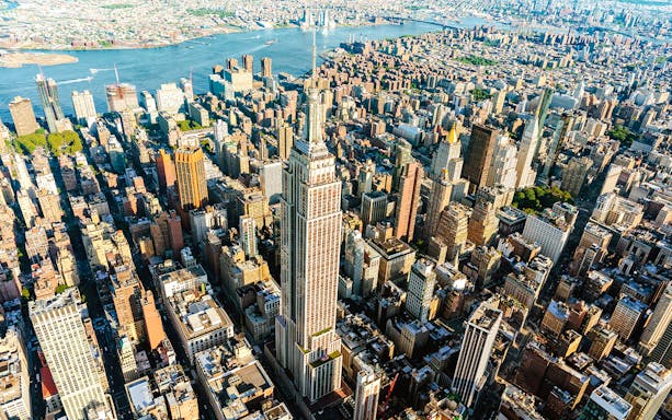 Aerial view of Midtown Manhattan skyscrapers with the Empire State Building.