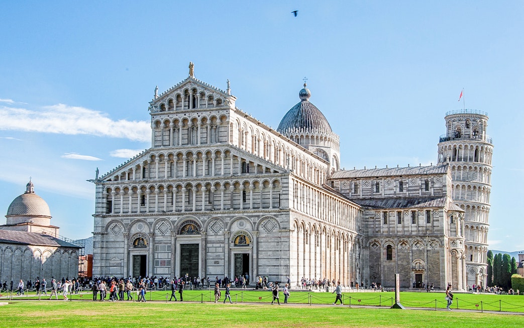 Pisa Cathedral with the Leaning Tower of Pisa in the background, Italy.
