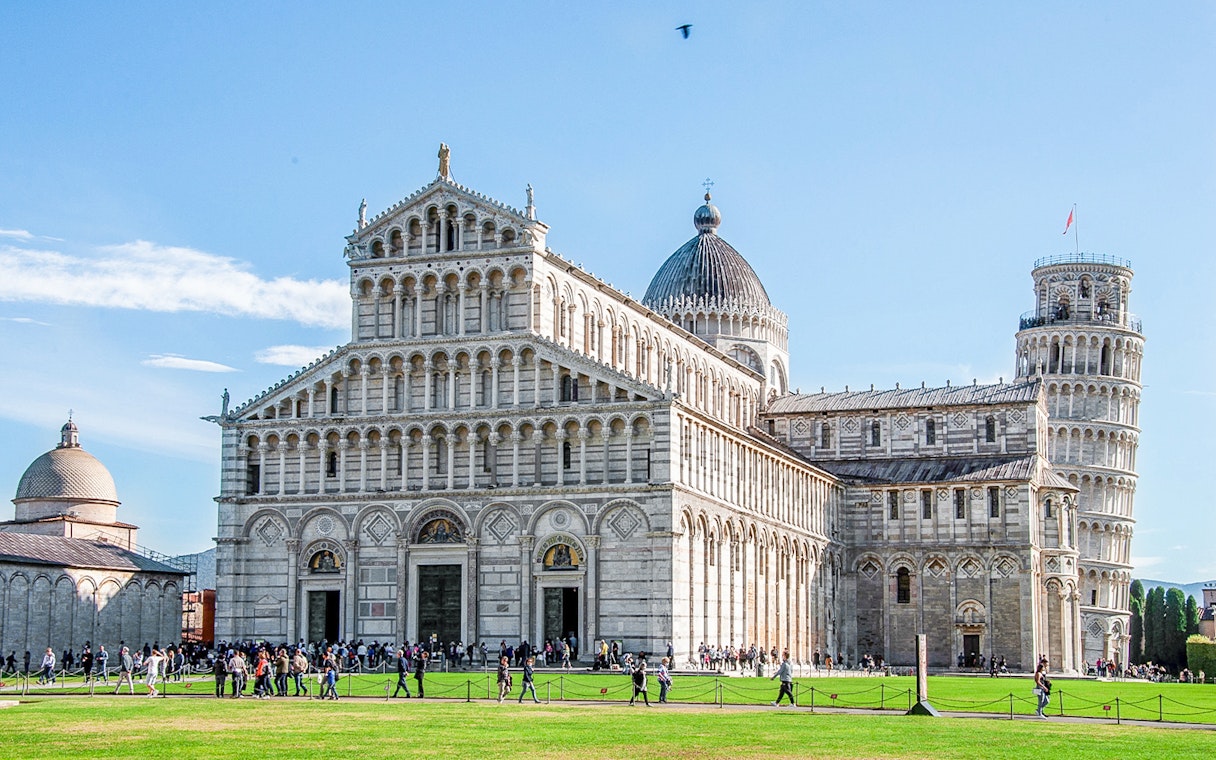 Pisa Cathedral with the Leaning Tower of Pisa in the background, Italy.