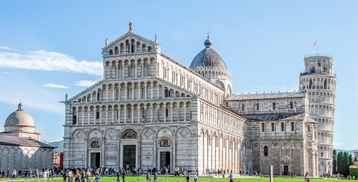 Pisa Cathedral with the Leaning Tower of Pisa in the background, Italy.