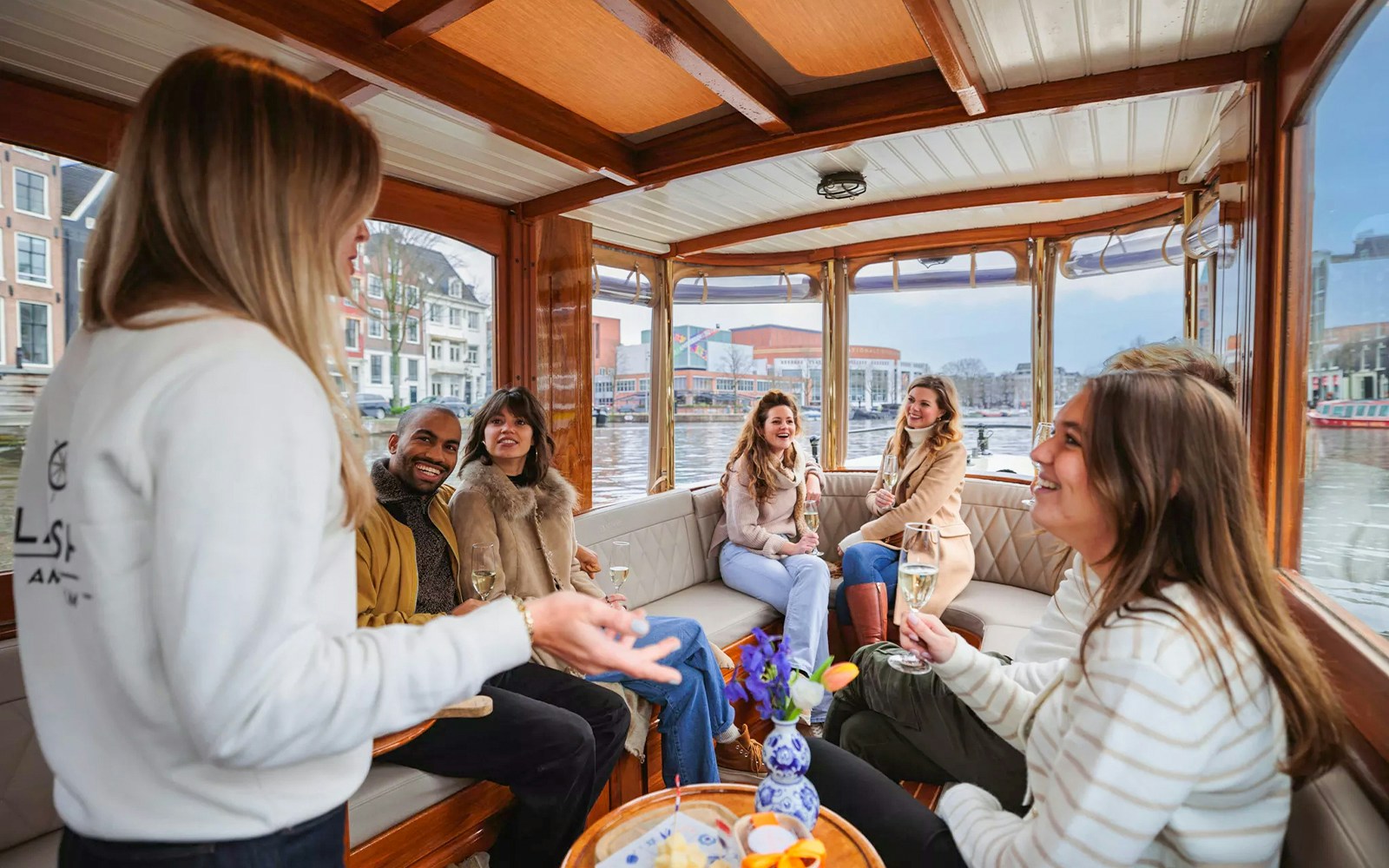 Guests enjoying a luxury romantic cruise on Amsterdam's canals.