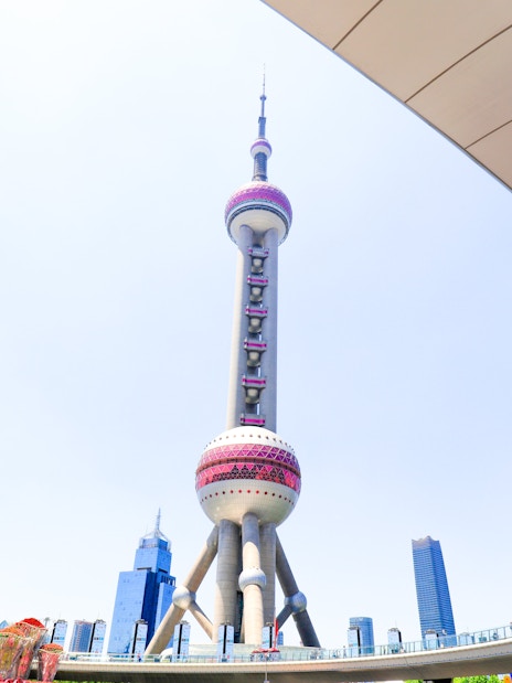 Oriental Pearl TV Tower in Shanghai, China, with surrounding cityscape.