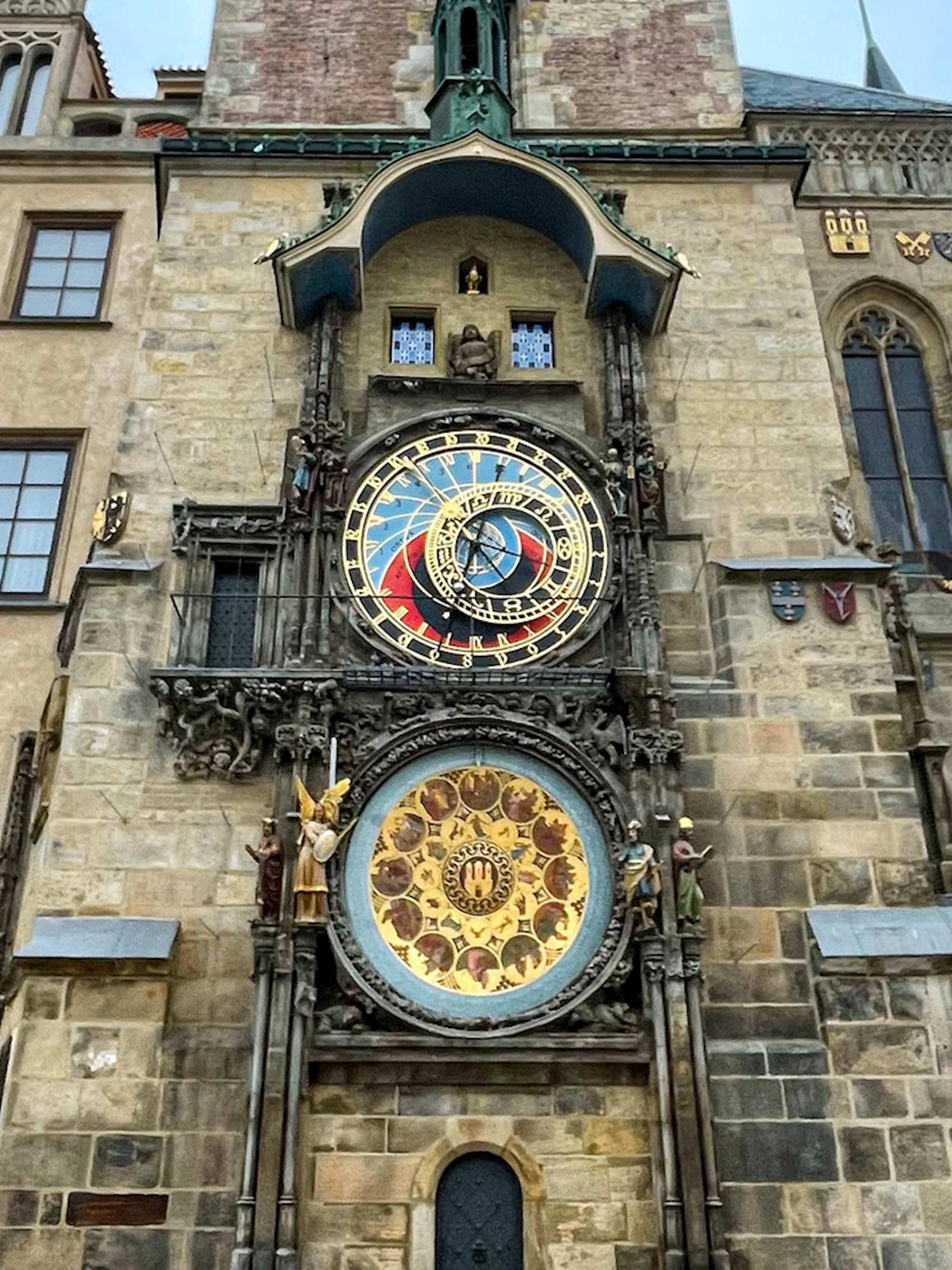 Astronomical Clock in Prague, intricate design with zodiac signs and figures.