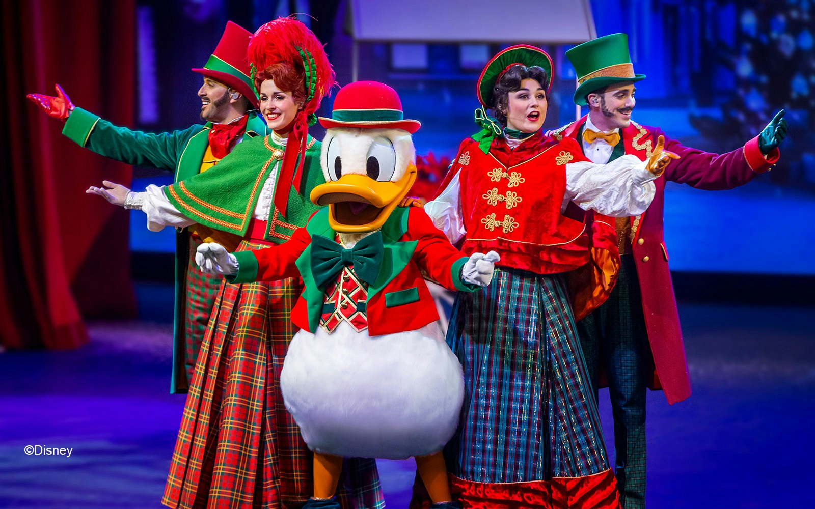 Disneyland Paris musical show with performers in colorful costumes on stage.