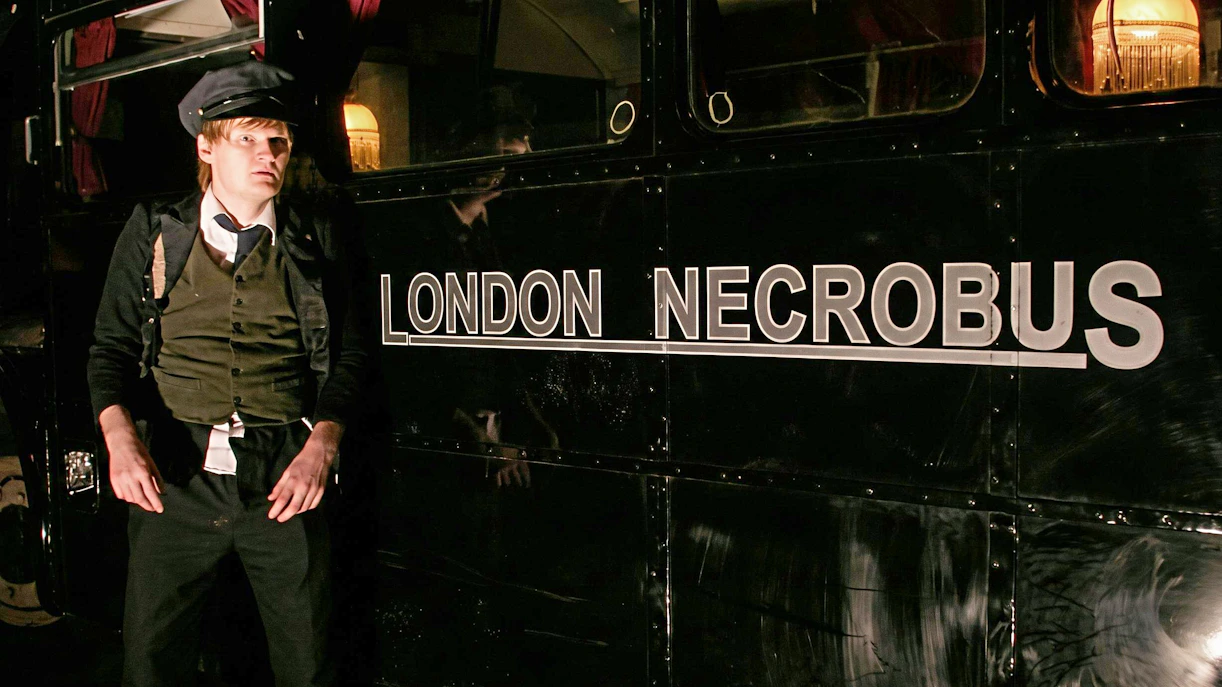 London Necrobus with guide for ghost tour.