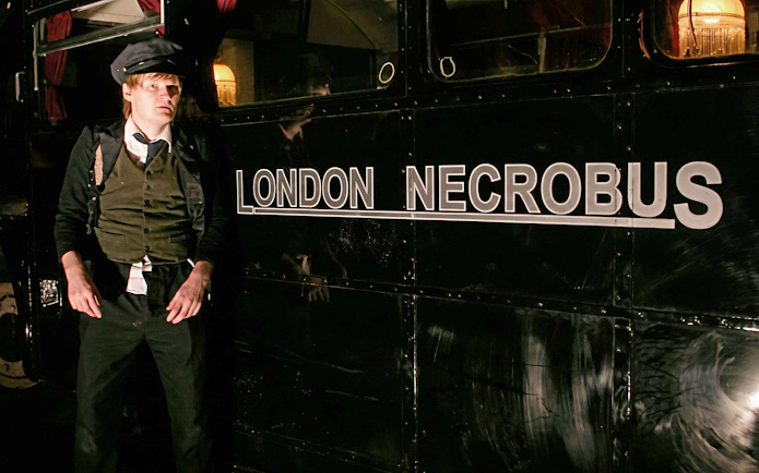 London Necrobus with guide for ghost tour.