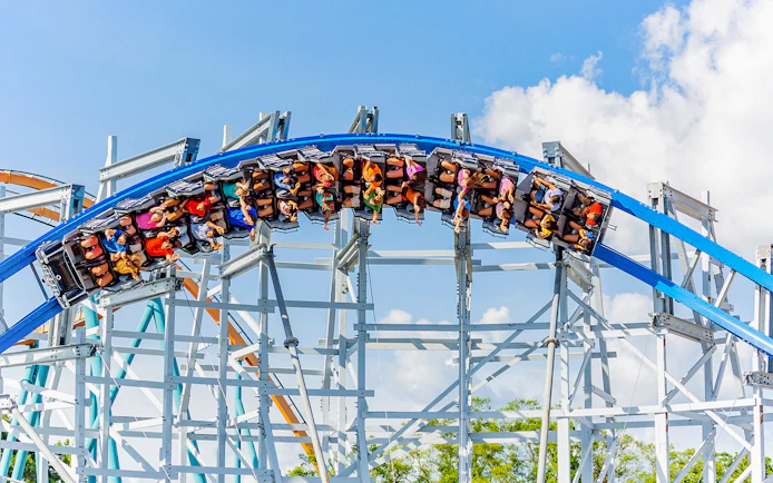 Roller coaster loop with riders at Six Flags Over Georgia.