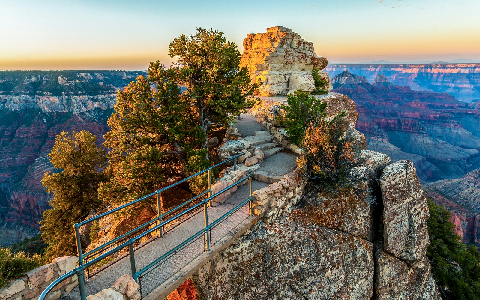 Bridge leading to Bright Angel Point, Grand Canyon National Park, Arizona, with canyon views.
