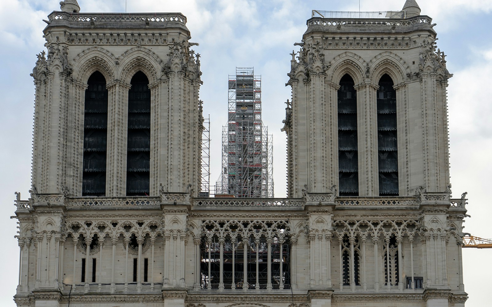 Notre Dame Cathedral reconstruction with scaffolding in Paris, France.