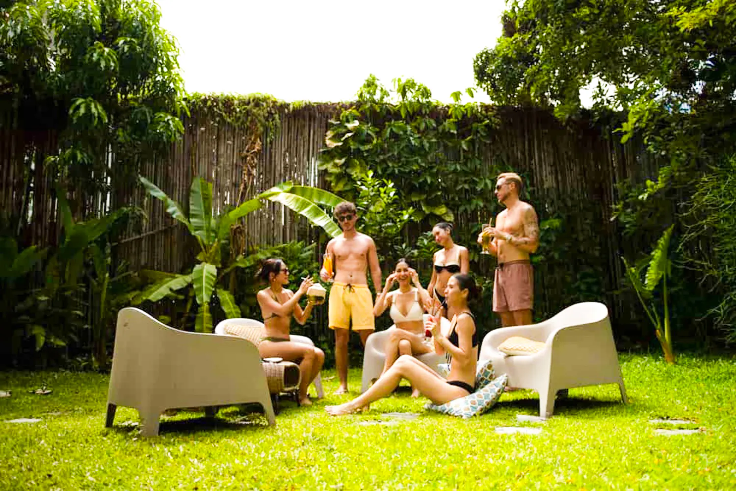 Group relaxing in garden at Yunomori Onsen & Spa, Pattaya.