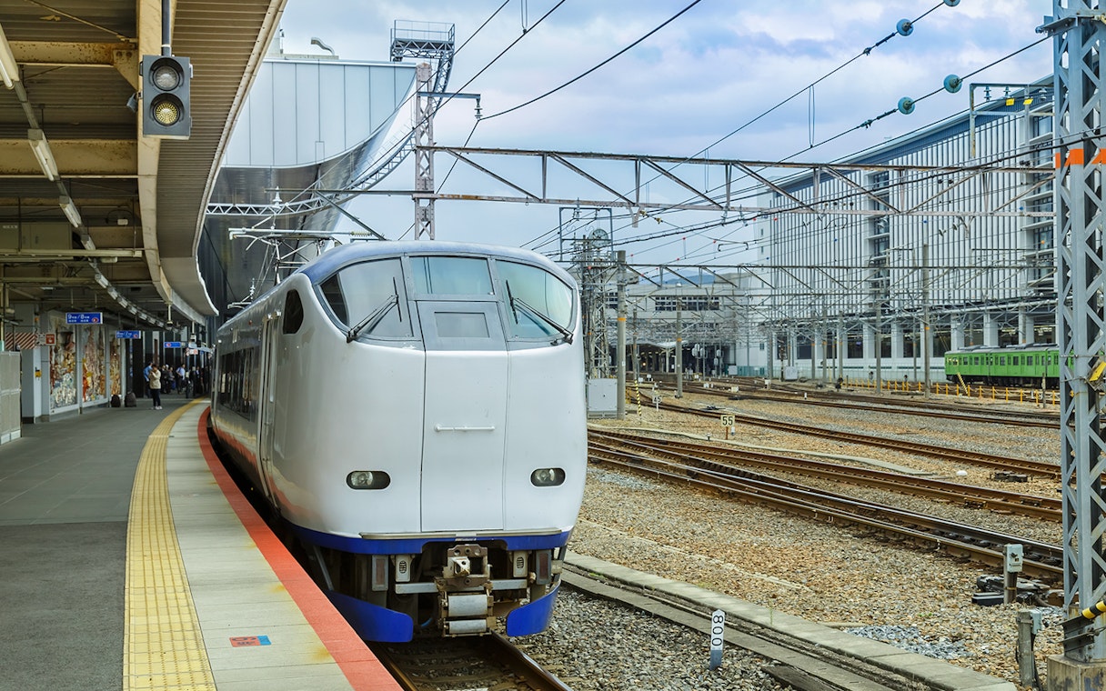 Train at a platform in a Japanese railway station, JR-West Kansai Rail Pass.