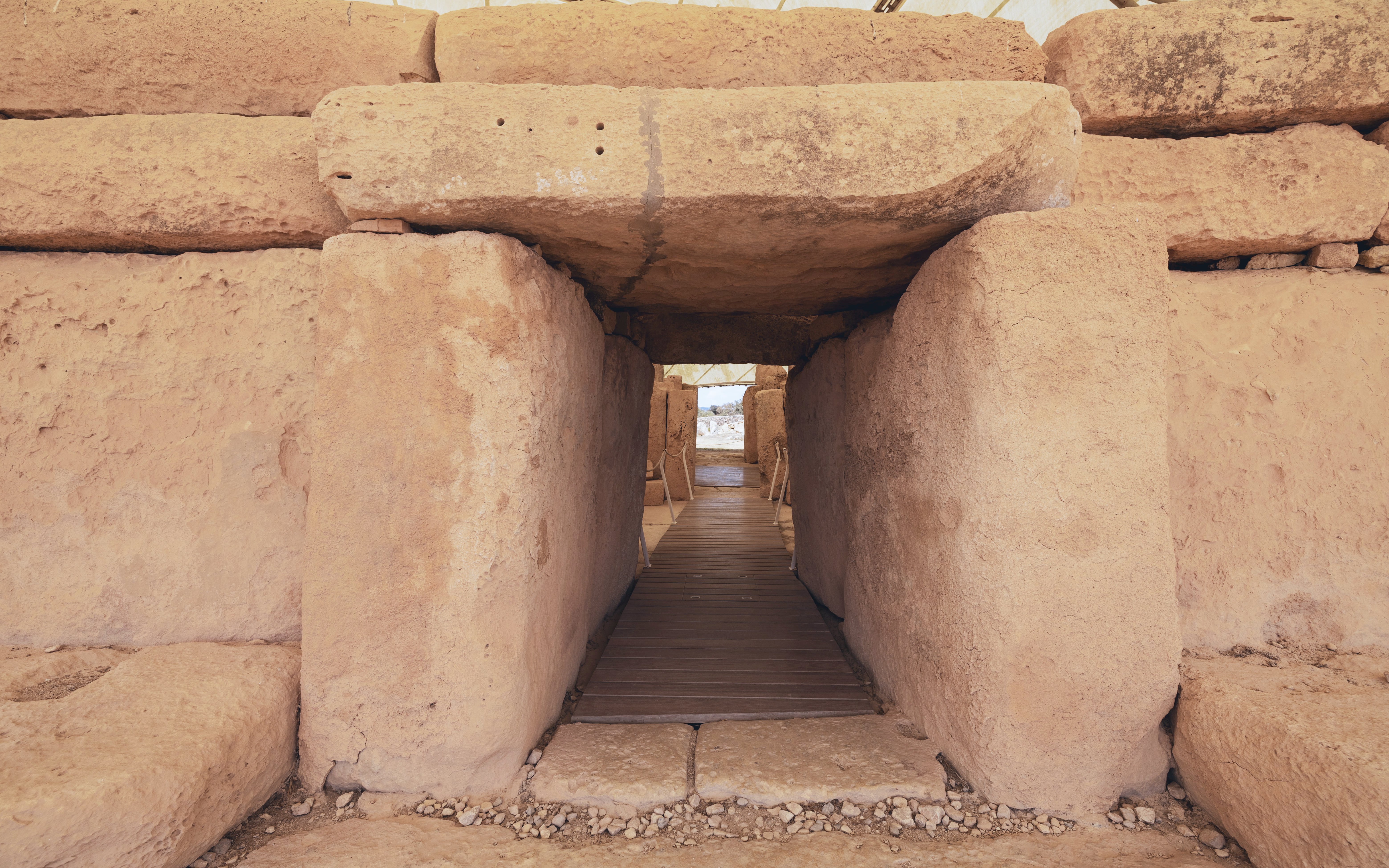 Ancient stone passageway at Ħaġar Qim Temples, Malta Heritage Pass.