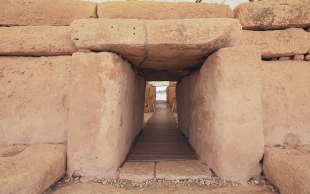 Ancient stone passageway at Ħaġar Qim Temples, Malta Heritage Pass.