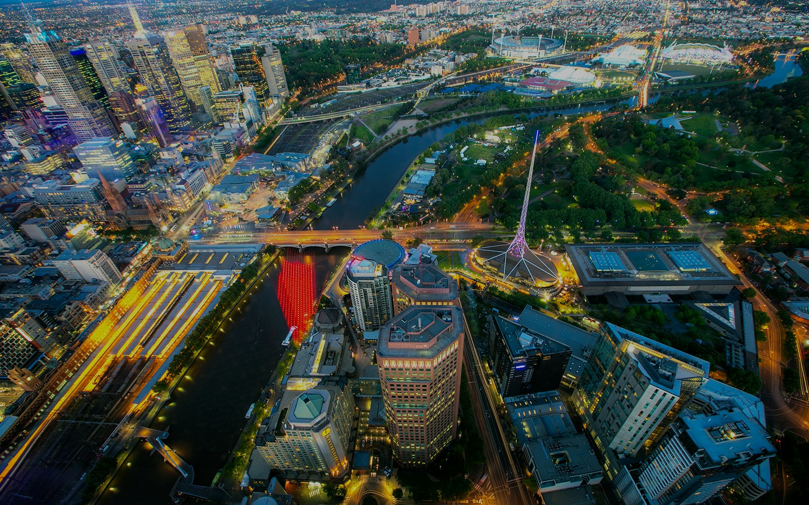 Aerial view of Melbourne cityscape from Skydeck, featuring Yarra River and Arts Centre.