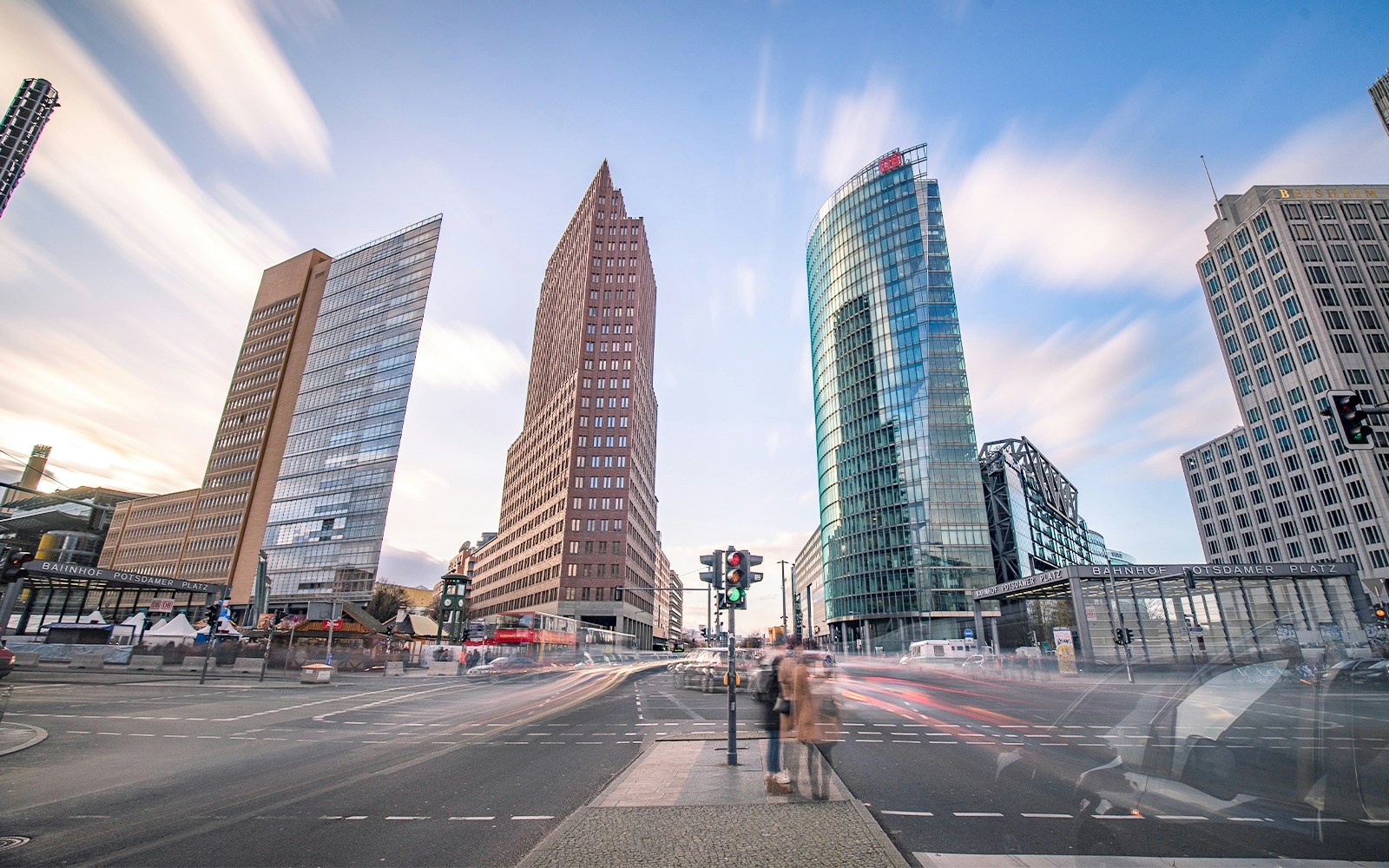Potsdamer Platz in Berlin with modern skyscrapers and busy street scene.