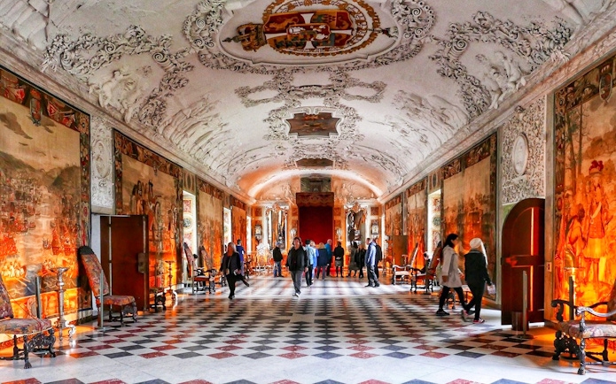 Frederiksborg Castle interior with visitors, part of Copenhagen Card attractions.