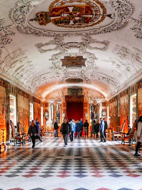Frederiksborg Castle interior with visitors, part of Copenhagen Card attractions.