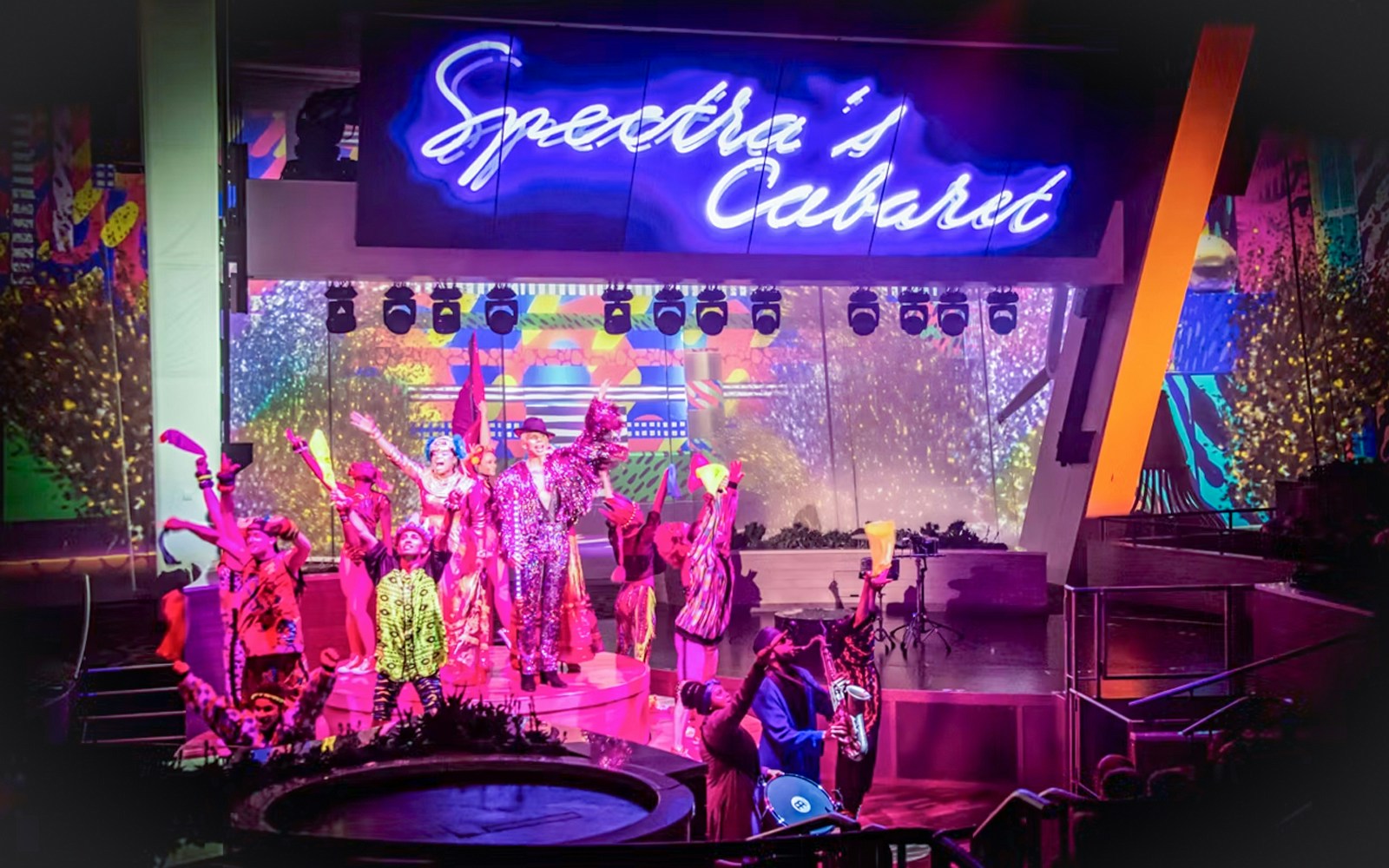Royal Caribbean cruise cabaret show with performers on stage, Singapore to Penang route.
