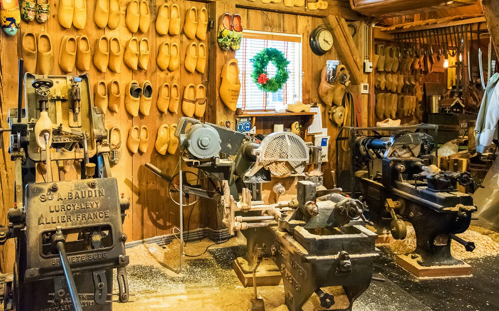 Wooden clog workshop with machinery in Zaanse Schans, Netherlands.