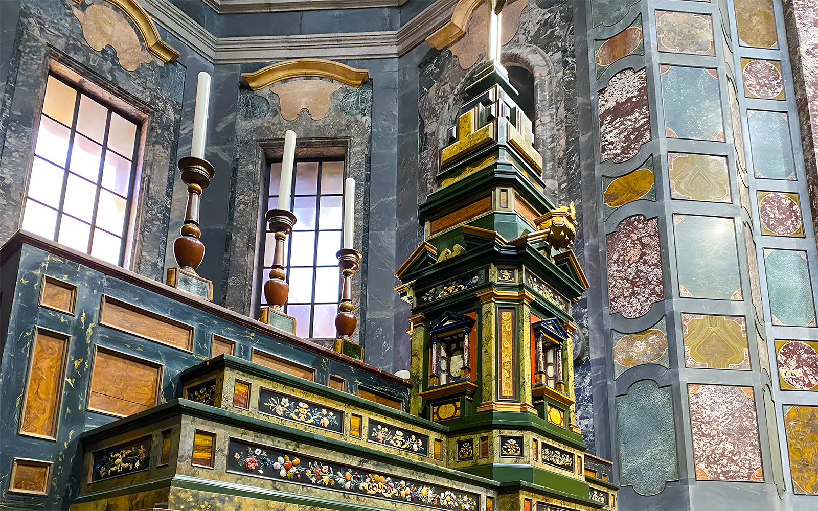 Medici Chapels ornate altar with intricate marble and woodwork details, Florence, Italy.