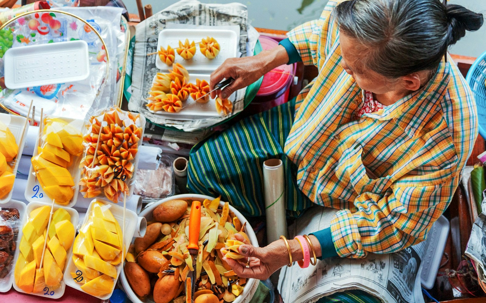 A fruit vendor at Damnoen Saduak Floating Market