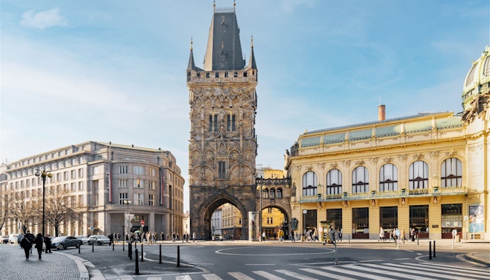 Powder Tower exterior view in Prague with surrounding architecture.