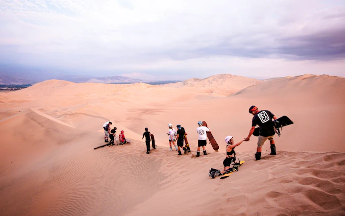 Dubai Morning Desert Safari with Dune Bashing, Sandboarding and Camel Ride