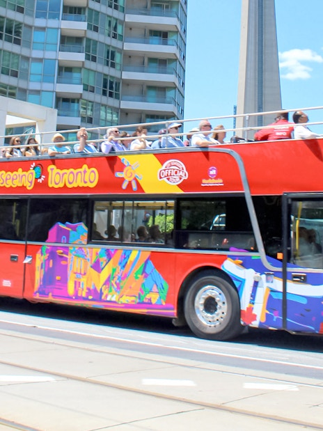 City Sightseeing bus in downtown Toronto near CN Tower.