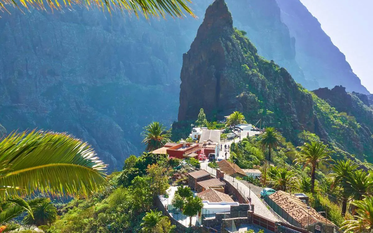 Masca Village nestled in lush greenery with mountainous backdrop, Tenerife.