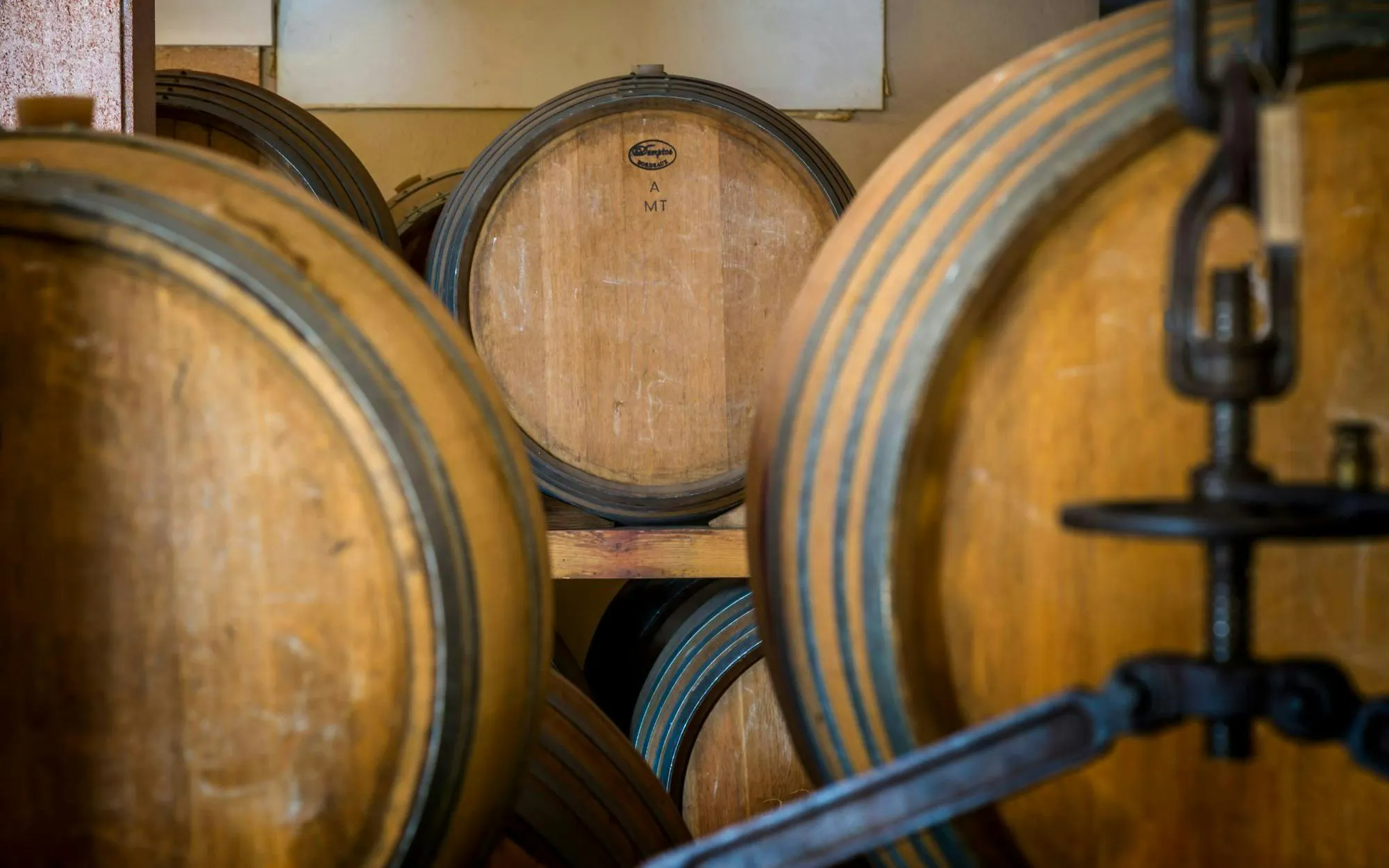 Traditional wooden barrels at Bodega Ramanya winery, Santa Maria del Camí, Mallorca.