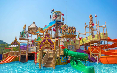 Colorful water slides and structures at Ramayana Water Park, Thailand.