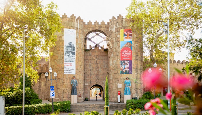 Poble Espanyol entrance with traditional Spanish architecture in Barcelona, Spain.