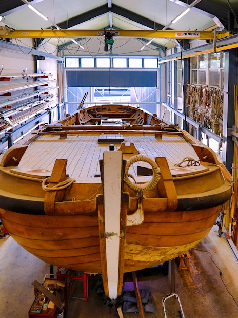 Restoration of traditional botter fishing boat inside Botterwerf workshop.