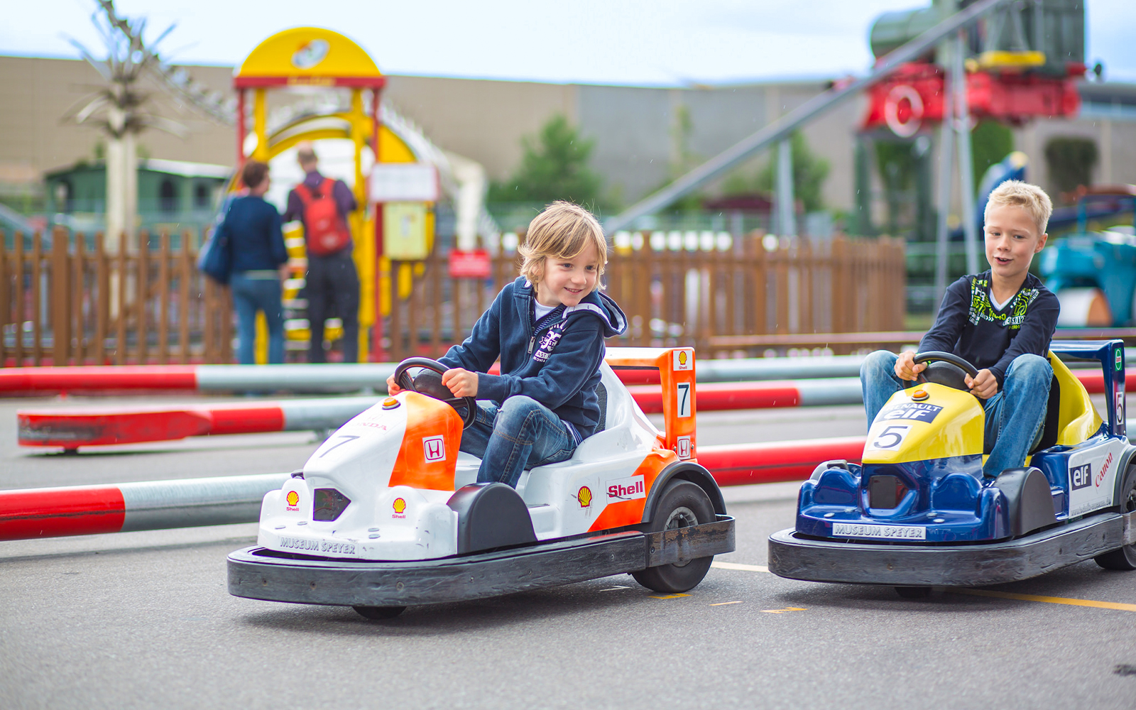 Children engaging with interactive exhibits at Sinsheim Technology Museum's play area.