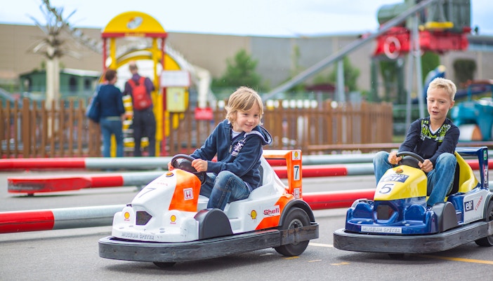 Children engaging with interactive exhibits at Sinsheim Technology Museum's play area.