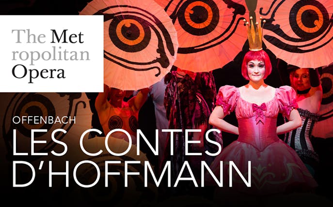 Performer in pink costume at The Met Opera's Les Contes d'Hoffmann.