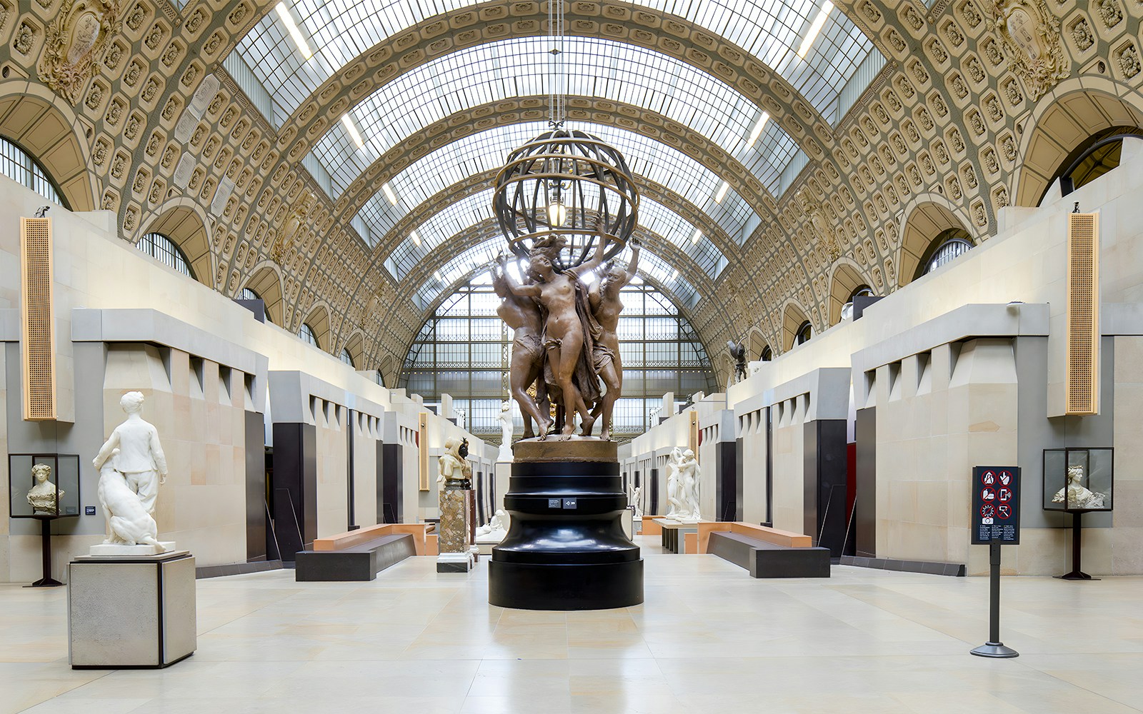 Visitors viewing paintings at Orsay Museum, Paris, with Rodin Museum combo tickets.