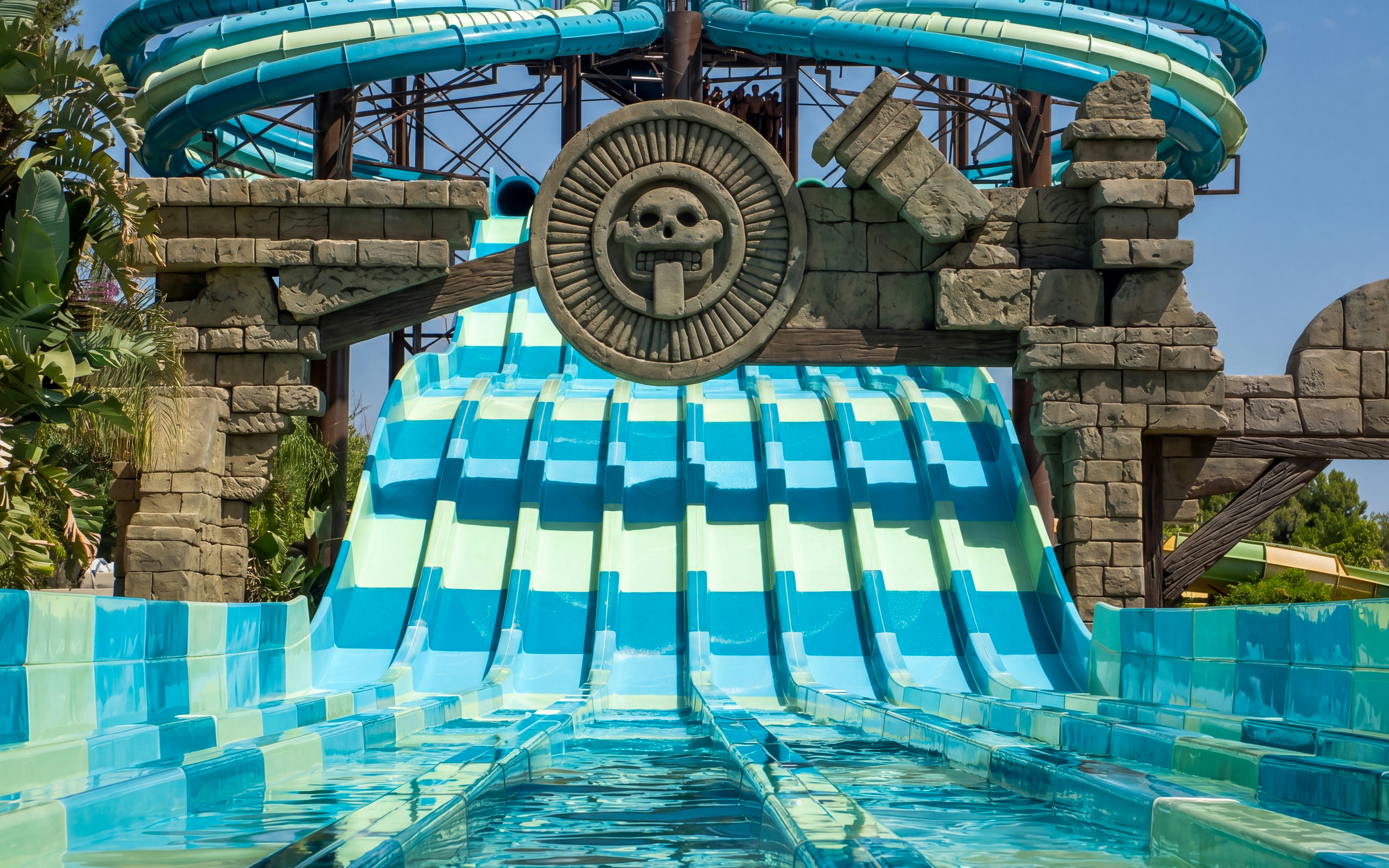 Speed Racer water slide at Aqualand Torremolinos with Aztec-themed entrance.