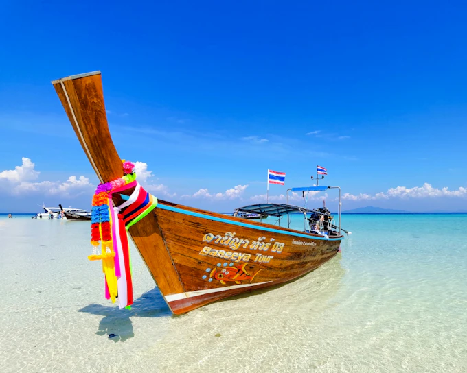 Krabi to Phuket Transfer via Phi Phi with Private Longtail Boat Tour and Maya Bay