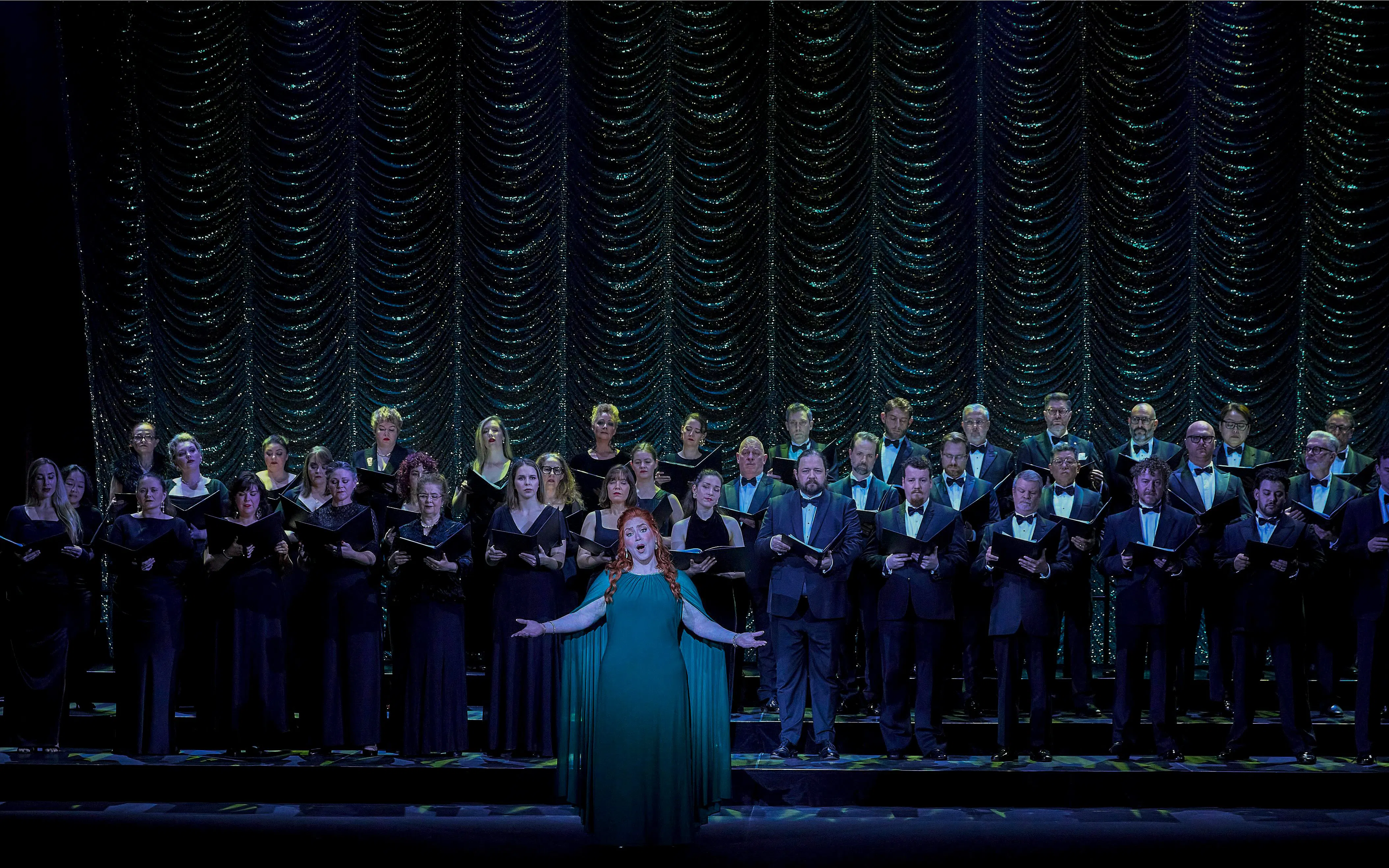 Chorus performing on stage during a production of My Fair Lady.