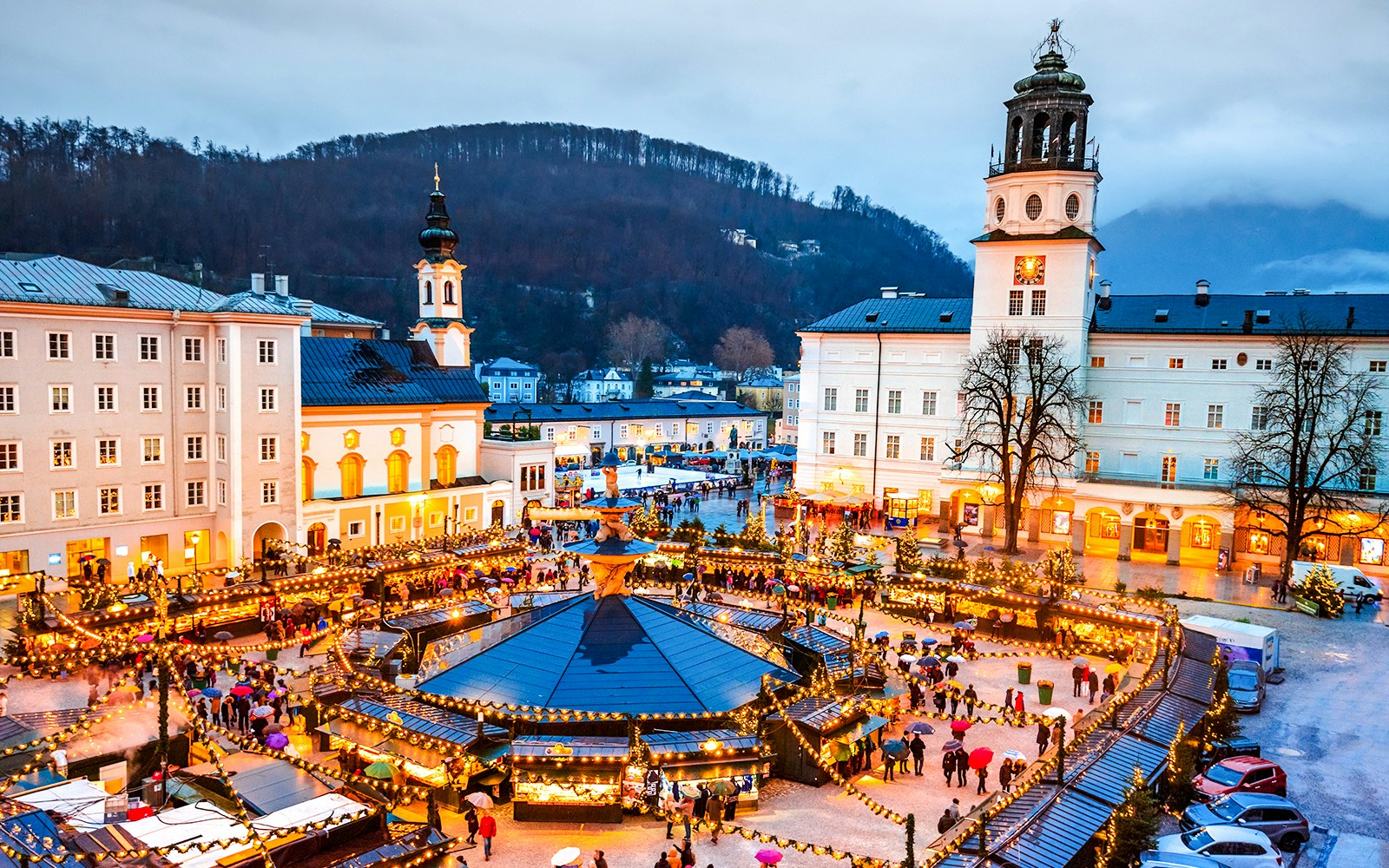 Christkindlmarkt in Salzburg with festive stalls and illuminated decorations.