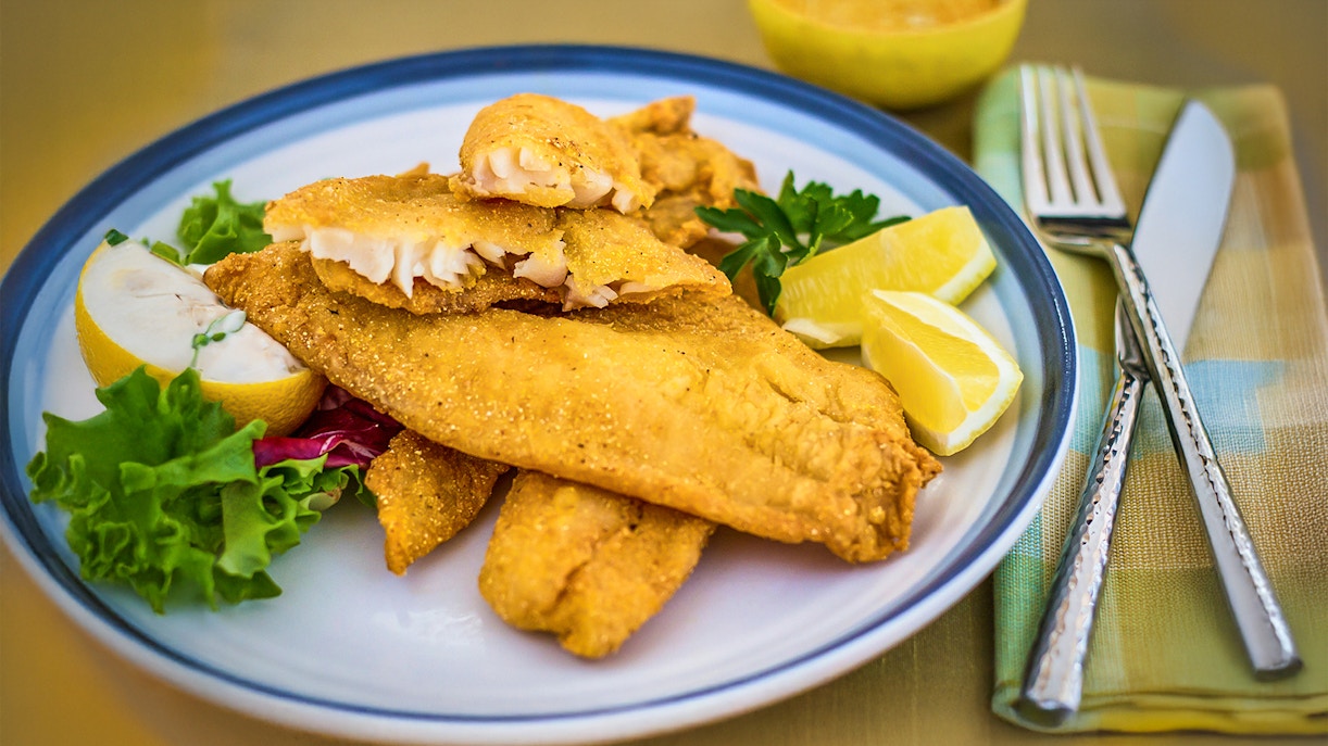 Everglades cuisine serving breaded catfish at a restaurant.