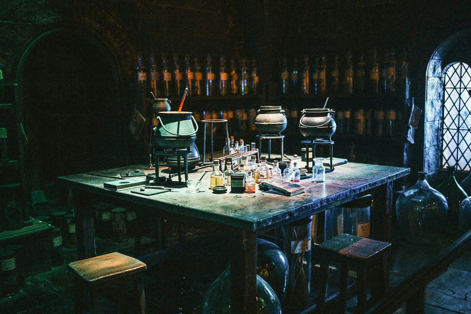 Harry Potter props displayed in a themed exhibit in London.